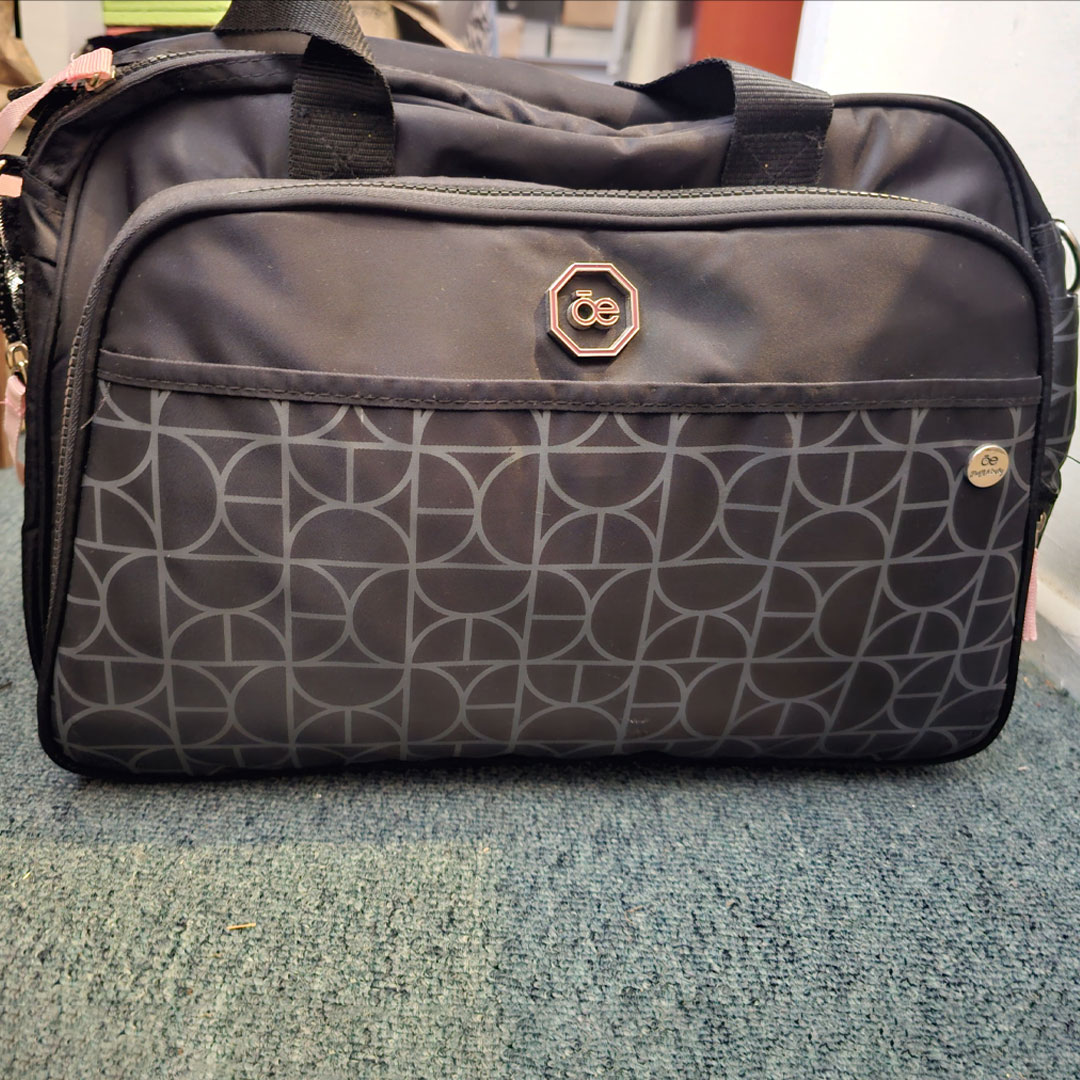 Bolso mudador y moises